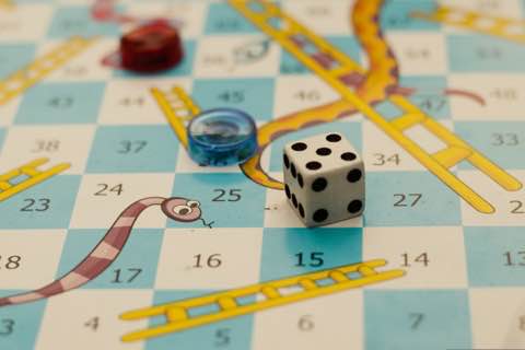 Close-up of a board game with dice on a table
